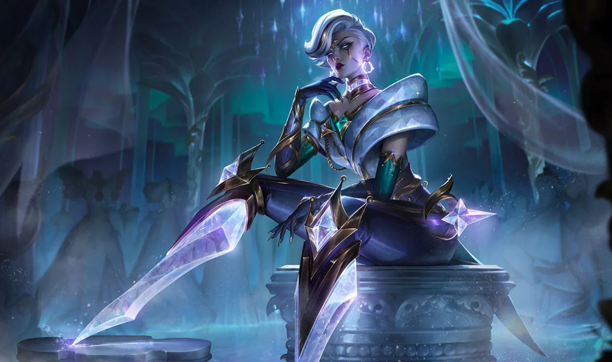 Prestige Winterblessed Camille sits with faceted crystal leg blades, sculpted pale shoulders, green sleeves, and swept silver hair inside an icy hall.