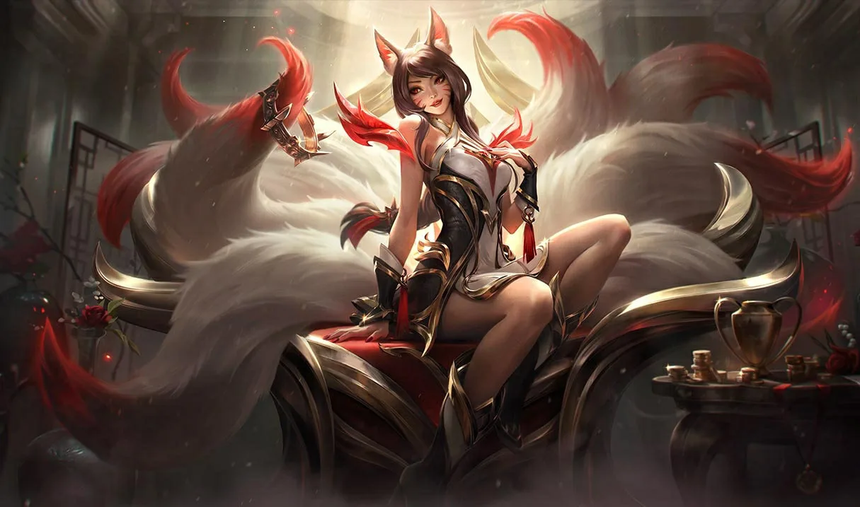 Risen Legend Ahri seated with her nine tails in official League of Legends splash art